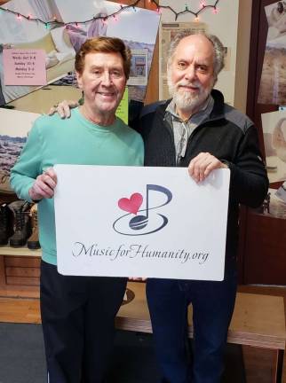 Thank you for helping Music for Humanity Jimmy Sturr with Barry Adelman (Photo provided)