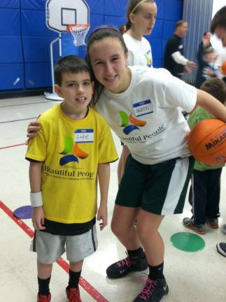 Hometown help This is 9-year old Luke Micallef, with his "buddy" Lauren Desrats; both are Warwick residents.