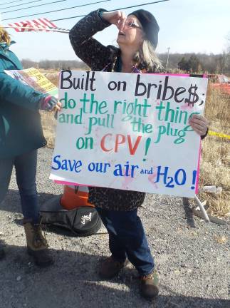 Corruption requires CPV permits to be revoked Photo by Frances Ruth Harris Kathy Frahme of Protect Orange County at a CPV power plant protest in January.
