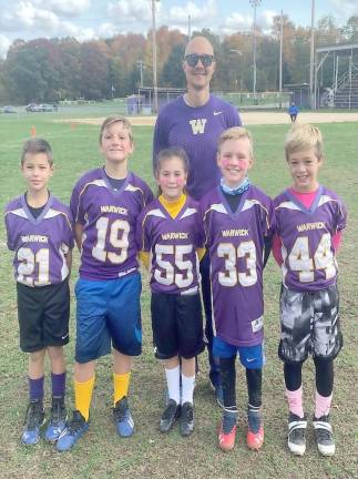 Warwick. Cheers for a successful season of youth football and cheerleading 2020 Warwick D1 Champions: Coach Geoff Green, Tommy Vega #21, Nico Green #19, Leah Elias #55, Mickey Reilly #33 and Leo Nicosia #44.