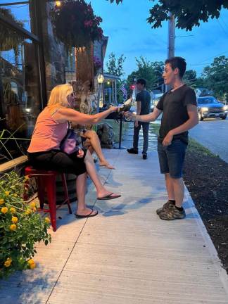 Johnny Gidney and Eric collecting signatures in Warwick.