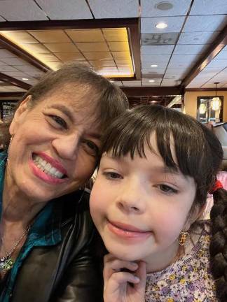 ‘That’s not my grandma, that’s my mom’ Lisa Johnson, of Middletown, with a granddaughter who was born methadone-addicted. Johnson took in four of her late son’s seven children over the years.