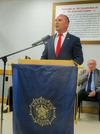 American Legion ceremony honors departed comrades . Warwick Town Supervisor Jesse Dwyer speaks during the ceremony
