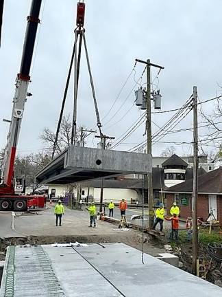 Bank St. Bridge drops into place