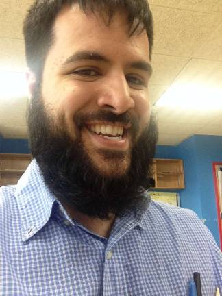 The Winning Beard Joey: Bronx Charter school - I grow it every November I am a High school Math Teacher would be cool to win and buy the kids lunch. My mom is always yelling at me that i can scare the kids with the beard. Thanks for a chance to win