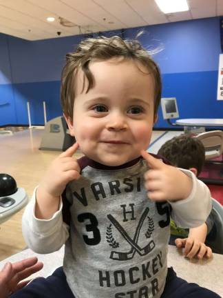 One Lucky Leprechaun Mason. The happiest guy in the bowling alley! Photo courtesy of Kali.