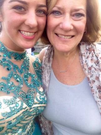 Mother Daughter Look A Like contest Photo submitted by Lisa McSweeney of Warwick "Christine and Lisa celebrating prom with all smiles."