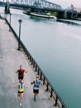 Running to vote? No, seriously Aerial shot of Hanna Cavanagh running with two friends a long the Hudson River to spread voter awareness for the upcoming election.