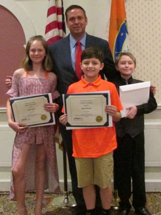 Neuhaus participates in 36th annual Orange County Executive’s Youth Awards Luncheon Provided photo Orange County Executive Steven M. Neuhaus poses with Outstanding Citizenship Award winners (from left to right) Molly Hewitt (Warwick Valley Middle School), Jaden Smernaos (Minisink Valley Middle School) and Logan Eisenberg (Monhagen Middle School in Middletown).