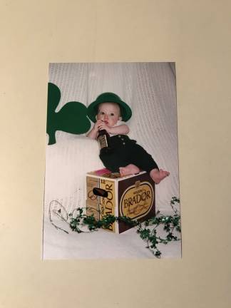 One Lucky Leprechaun I created a 12 month calendar of my first born son Austin. Every month had a holiday and March had this. My husbands favorite beer, small enough to sit on the case. Austin is pondering when he is old enough will he like this beer. Happy Saint Patrick's Day.