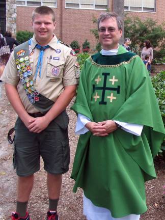 Eagle Scout Tim Snyder refurbishes prayer garden at St. Stephen’s Parish Eagle Scout Tim Snyder with the Rev. Michael McLoughlin, pastor of the Church of St. Stephen the First Martyr, at the blessing of the refurbished prayer garden.