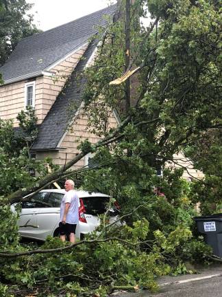Severe thunderstorms cause havoc in Village of Warwick Photo by Terry ReillyHigh wind gusts downed trees, which in-turn knocked down power lines and a transformer. At least one home and one vehicle as well as a telephone pole suffered serious damage.