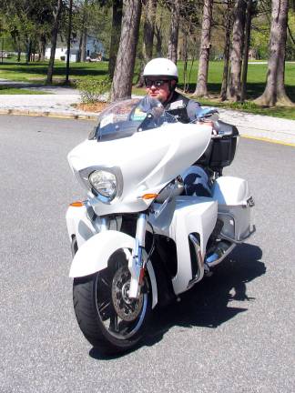 St. Stephens first motorcycle blessing and ride set for May 19 Photo by Roger Gavan St. Stephenís Parochial Vicar Father Angelo Micciulla, chaplain of the Hudson Valley Chapter of the Shamrocks Motorcycle Club, riding his Victory Cross Country Tour motorcycle.