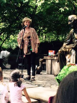 Florida Public Library hold its Storytelling Café on Sept. 23 Storyteller Judith Heineman tells a Grimm's tale at the Hans Christian Andersen statue in Central Park. She will be the featured storyteller at the Florida Public Library's annual Fall Storytelling Cafe on Friday, Sept. 23, at 7 p.m.