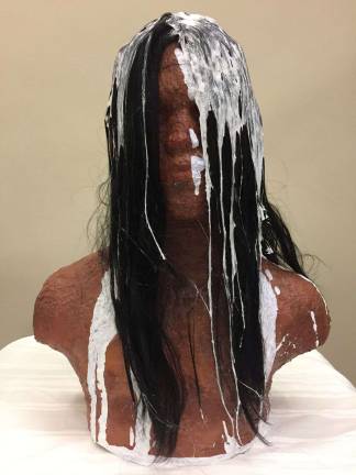 'An Artist’s Response to Human Rights' "Assimilation Through Alabaster," plastercraft, acrylic and mixed media, by John Uhelsky, Monroe-Woodbury High School.