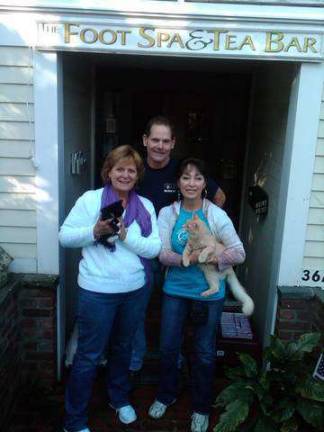 Business owners help Warwick Valley Humane Society From left, Jo-Ann and Chris Daly with Suzyn Barron, of the Warwick Valley Humane Society, are seen with two of the hundreds of cats available for adoption at the shelter.