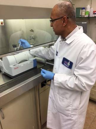Aurochemicals acquires Thermo Scientific Nicolet iS5 FT-IR Spectrometer Provided photo Naitram Persaud, Aurochemicals' quality assurance/quality control manager, completes a test using Aurochemicals' new Thermo Scientific Nicolet iS5 FT-IR Spectrometer.
