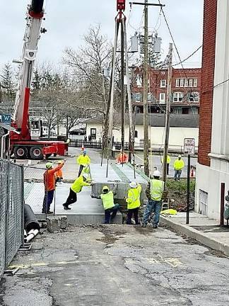 Bank St. Bridge drops into place