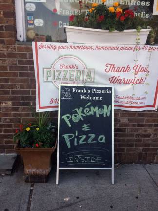 ‘Gotta catch ‘em all’ Photo By Linda Smith Hancharick Sign outside Frank's Pizzeria in Warwick