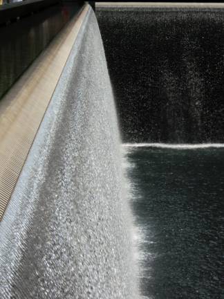 Eleven years of reflection Susan Slater-Tanner's photo: "The abyss." Ground Zero 2012.