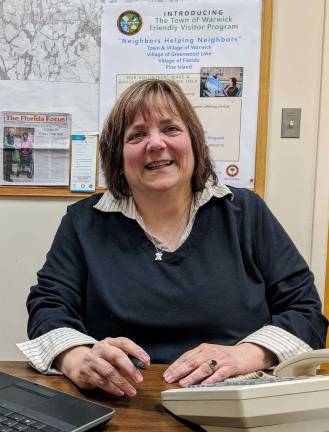 Friendly Visitor Program marks growth in Warwick Friendly Visitor Program Coordinator Marie Lucas manages her administrative responsibilities from a work station at Warwick Town Hall. She serves on a volunteer basis.