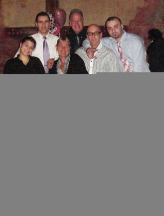 Grappa Ristorante Backpack Snack Attack fund raiser nets $5,700 Grappa Ristorante in Warwick recently hosted a fund raiser which raised more than $5,700 for the Backpack Snack Attack Program. Members of the restaurantís staff are front: Johnny Drazhi; second row, from left: Lauren Quartarone, Tony Sylag and Alex Santiago; third row, from left: Kiara Helen Mignone, Adele Singer and Gaetano Russo; and rear, from left: Valdet Berisha, Len Singer and Vinny Dambrroci.