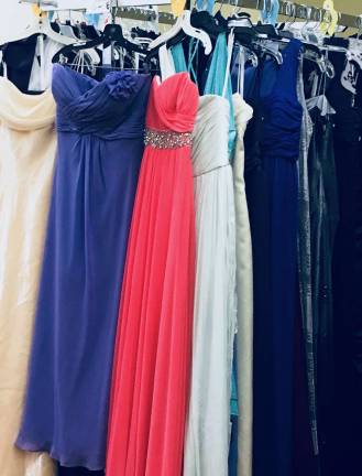 Springtime means dress up time at the Warwick Hope Chest The Fashion Floor at the Warwick Hope Chest is displaying long and short gowns in a variety of colors as well as classic black and white with shoes, bags and accessories.