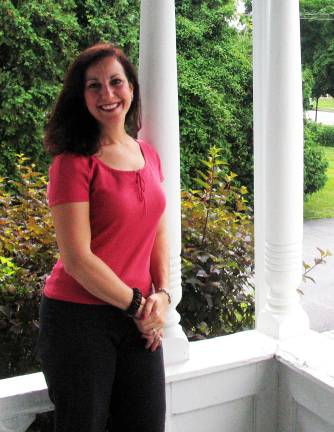 Have technology, will travel Photo by Roger Gavan Warwick businesswoman Lisa Montanaro.