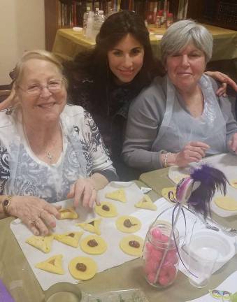 Chabad’s Purim celebration taking us back to the ‘Shetl’ on March 12 Stacey Finkelstein of Middletown, Chana Burston of Monroe and Sheryl Kerewski of Goshen enjoy baking Hamantaschen together at Chabad of Orange County's Hamantaschen Bake.