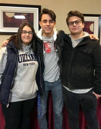 'Music is what brings us together' Photo by Noreen Hanson Three Warwick Valley High School students were chosen by audition to represent their school at the New York State School Music Association’s annual ALL–STATE performance in Kodak Hall at Eastman Theater in Rochester earlier this month. Pictured from left to right are Izabele Horowitz, Ethan Tuomala and Daniel Brenner.
