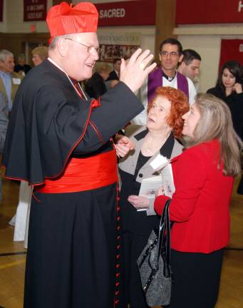 Cardinal Timothy Dolan: 'I pledge' File photo by Ed Bailey Cardinal Timothy Dolan shares a few words at Sacred Heart Parish in Monroe on Feb. 23, 2012, just days after Pope Benedict XVI appointed him. The church's pastor, the Rev. Thomas J. Byrnes, center, looks on.