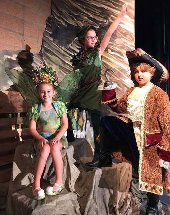 It’s a family affair Tinkerbell (Abigail Yurchuk), Peter Pan (Charlie Curabba),and Capt. Hook (Lucas Cresser).