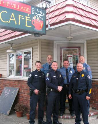 Another round of coffee and cops Photos by Roger Gavan On Saturday, March 5, the Town of Warwick Police Department held a joint "Coffee with a Cop" event with the Greenwood Lake Police Department at the Village Buzz Cafe in Greenwood Lake. Pictured in front, from left to right, are Greenwood Lake Police Officer Greg Hart, Detective Sgt. Adam Eirand and Chief John Hansen; and standing behind: Warwick Police Officer Steve Helmrich, Lt. John Rader and Lt. Tom Maslanka.