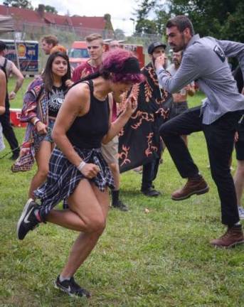 Battle Candle Festival at Wickham Lake attracts 33 area bands Photo by Nicole SpangenbergThe collective dance.