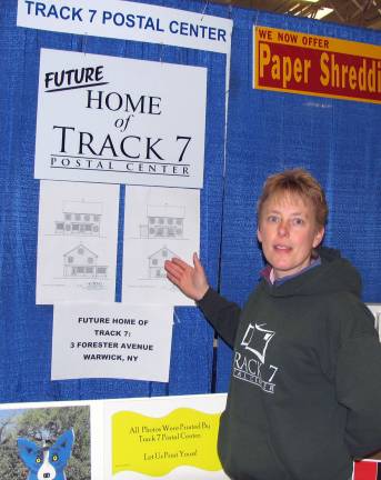 Seventh annual Warwick Valley EXPO 2014 welcomes more than 1,000 visitors Betsy Mitchell, co-owner of Track 7 Postal Center, points to the stores future home on Forester Avenue. Additional photographs appear online at warwickadvertiser.com.