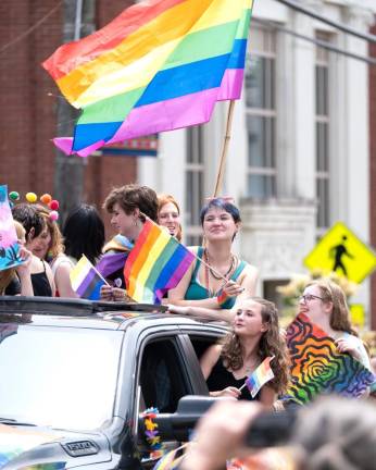 Pride event attendees enjoy the parade.