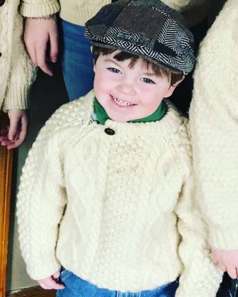 One Lucky Leprechaun Colin celebrating his heritage during a St. Patrick’s Day parade