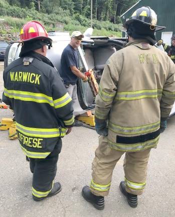 Warwick. Warwick Fire Department weekly report Past Captain and WFD Extrications Officer Dan Dixon demonstrates Res Q Jacks Operation to firefighters.