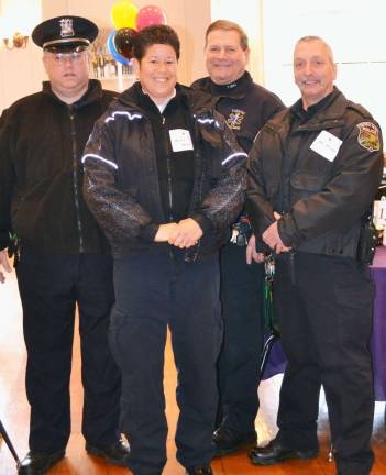 The tradition continues Tuxedo Park Police Officers Mauro and Ascione (far left and far right) with Tuxedo Volunteer Ambulance EMTs Jenny Velaz and Robert Randhare.