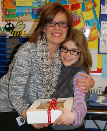 Apples of their students' eyes Photos provided by the Warwick Foundation for Excellence in Leaning Park Avenue Elementary School teacher Lisa Ramus with one of her students, Melina Garby. "She really cares about her students," Melina wrote.