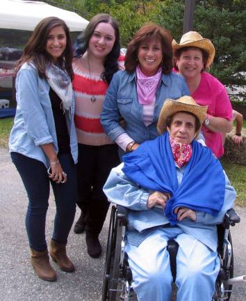 Schervier Pavilion celebrates grandparents Residents stated that most of all they enjoyed getting together with their families for a fun afternoon. Spending the afternoon with resident Sarah De Giorgio are, from left, her granddaughters Nicole Coluccio and Ashley Flanagan and her daughters Marie Coluccio and Teresa Flanagan.