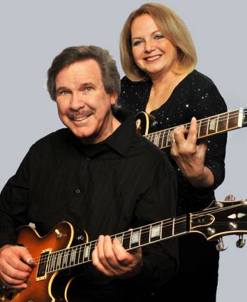 Summer music series at the library opens July 24 ï August 24 at 7pm outdoors Les Paul and Mary Ford Tribute Master guitarist Tom Doyle and his wife Sandy Cory will fill the shoes of Les Paul and Mary Ford, performing some of their wellñknown hits on Aug. 24 as part of the summer music series at Albert Wisner Public Library.