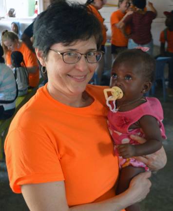 Bringing help and hope Mary Juliano serving in one of the clinics.