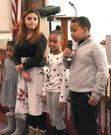 Early in the service members of the Union AME Young Adult Ministry read a series of statements about the Call for Justice.