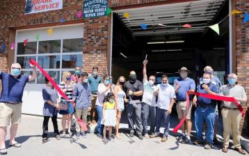 On Saturday, July 18, members of the Pine Island Chamber of Commerce joined the partners, along with staff, relatives and associates to celebrate the grand opening of Pine Island Garage at 642 County Route 1 in Pine Island. Provided photo.