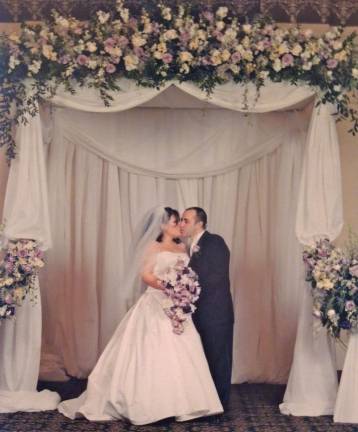 Locals celebrate Valentine's Day Couple: Daniel and Cara Capela of Andover, N.J. Wedding date, location: Jan. 12, 2003, in Summit, N.J. Valentine's Day tradition: My wife's favorite color is purple so that became tradition when it comes to flowers. "Just celebrated our 10 Year Anniversary!"