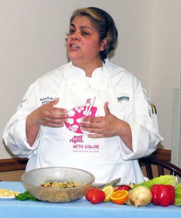 St. Anthony Community Hospital hosts gluten-free food preparation demonstration Carmela Decker, assistant food service director at St. Anthony Community Hospital and a graduate of the Culinary Institute of America, fields questions while demonstrating how to prepare a gluten-free apple quinoa salad at a May 10 meeting of the Orange County Celiac Foundation Support Group at Mount Alverno Center.