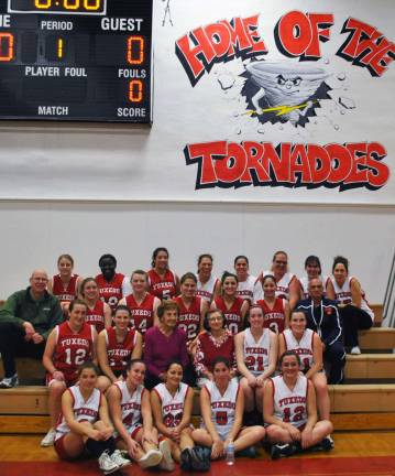 A game for the ages Photo provided by Principal Denis M. Petrilak/ George F. Baker High School Before the alumni game, flowers were presented to honorary captains and first cousins Margaret Mottola Iannone and Tina Mottola Kusion, who starred at Baker in the mid 1930s. Their team won over 110 straight games.
