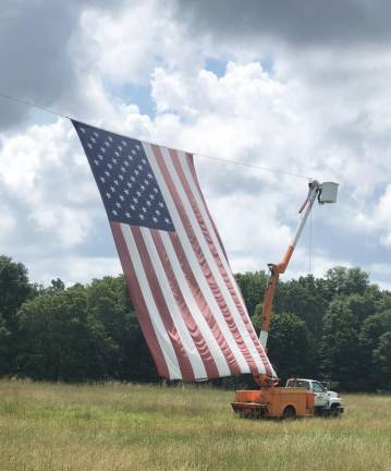 Bryan and Abbey Ashley’s flag flying high off Route 94 in Warwick.