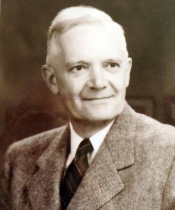 A portrait of Seely &amp; Durland founding principal Harry S. Seely hangs on the wall in the conference room at firm's offices at 13 Grand Avenue. Seely was an original signer of the Certificate of Incorporation and the first president of what today is the Warwick Valley Chamber of Commerce.